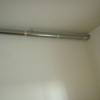 Conduit d’évacuation trop long / Relocalisation du conduit d’évacuation